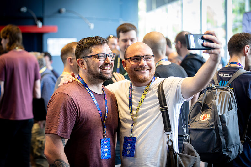 Attendees taking a selfie together
